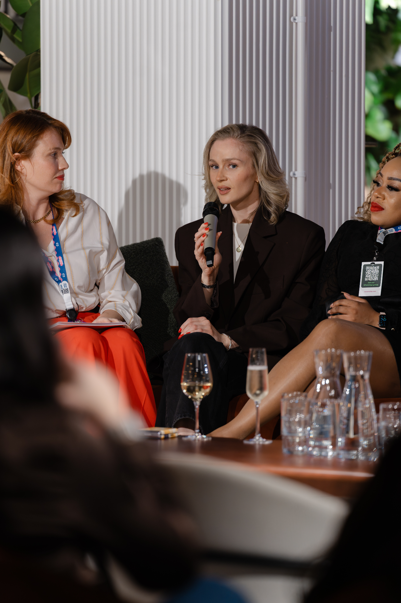 Alex Young speaking on a panel at Women in Flex