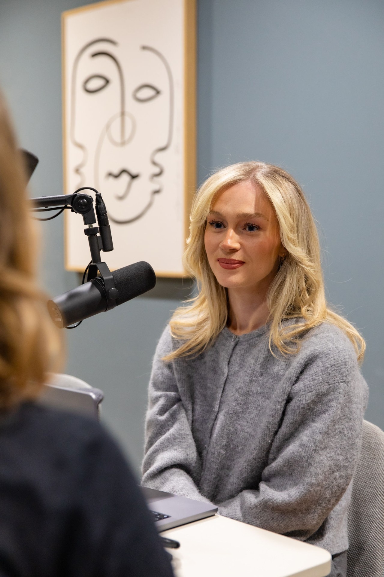 Alex Young recording the Favourite Positions podcast